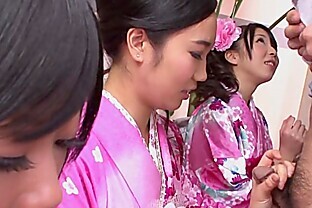 Three geishas sucking on one lonely cock