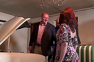 German Redhead teens paying the mechanic