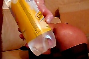 This lady swallows huge objects and fists with her once tight asshole 5 min