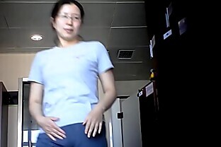 Asian Milf shows small tits ass and pussy in locker room
