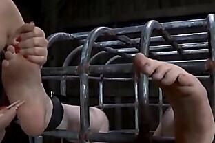 Sweetheart is handcuffed in shackles during hardcore bdsm t.
