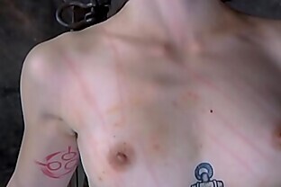 Hottie is chained in shackles during hardcore bdsm t.