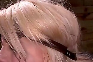 Shackled blindfolded blonde deep throats huge dick