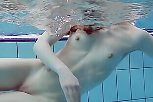 White swimsuit with tattoos babe Roxalana Cheh underwater