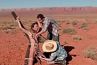 Hitchhiker hogtied in the desert