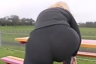 Mature milf walk with big ass leggings in park