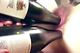 Sluts try one sticks a bottle in the ass and one in the pussy