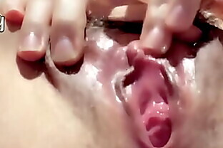 Closeup clit rubbing of wet Asian teen