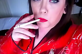 Fat UK Slut In PVC Mac Smoking