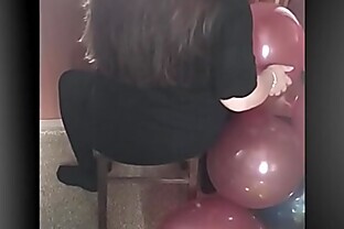 girl ride to pop balloons