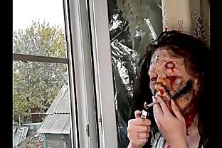 wife smokes cigarette makeup zombie