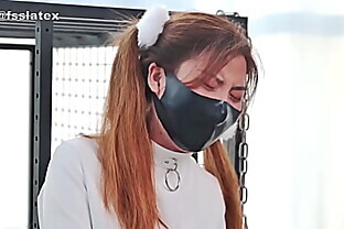 asian latex catsuit woman straitjacket bondage