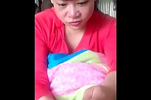 Asian babe gives nice handjob