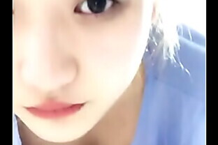Japanese teen showing assets while doing makeup