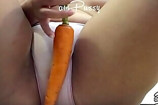 Carrot in pussy close-up