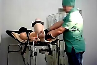 Gyno exam in black latex gloves