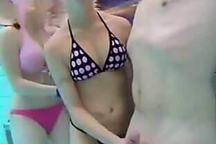 teen gives handjob and blowjob in public pool