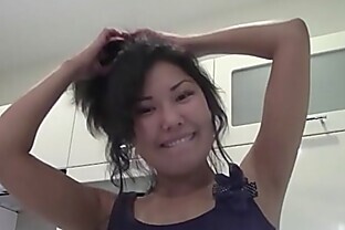Cute Asian gets completely naked in the bathroom