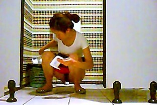 Malay Hooker with Toys at Toilet