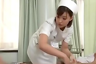 Sexy japanese nurse giving patient a handjob