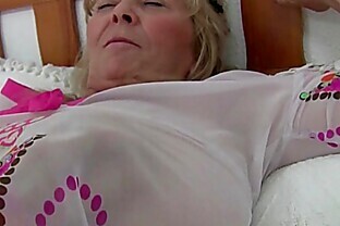 British granny Isabel has big tits and a fuckable fanny
